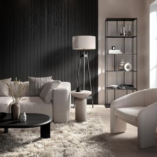 living room with wooden flooring and grey sofa set
