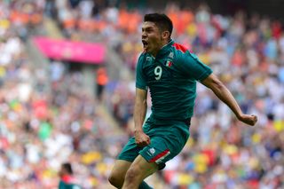 Oribe Peralta celebrates after scoring Mexico's second goal against Brazil in the final of the men's football tournament at the 2012 Olympics.