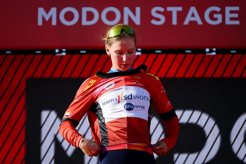 MADINAT ZAYED UNITED ARAB EMIRATES FEBRUARY 09 Lorena Wiebes of The Netherlands and Team SD WorxProtime celebrates at podium as Red leader Jersey winner during the 2nd UAE Tour 2024 Stage 2 a 113km stage Al Mirfa Bab Al Nojoum to Madinat Zayed UCIWWT on February 09 2024 in Madinat Zayed United Arab Emirates Photo by Dario BelingheriGetty Images