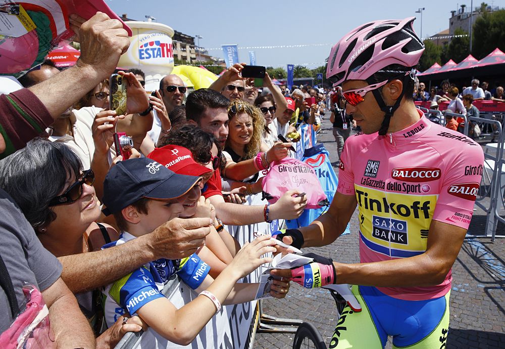 Alberto Contador (Tinkoff-Saxo) signing autographs for fans at the start of stage 10 Giro d'Italia