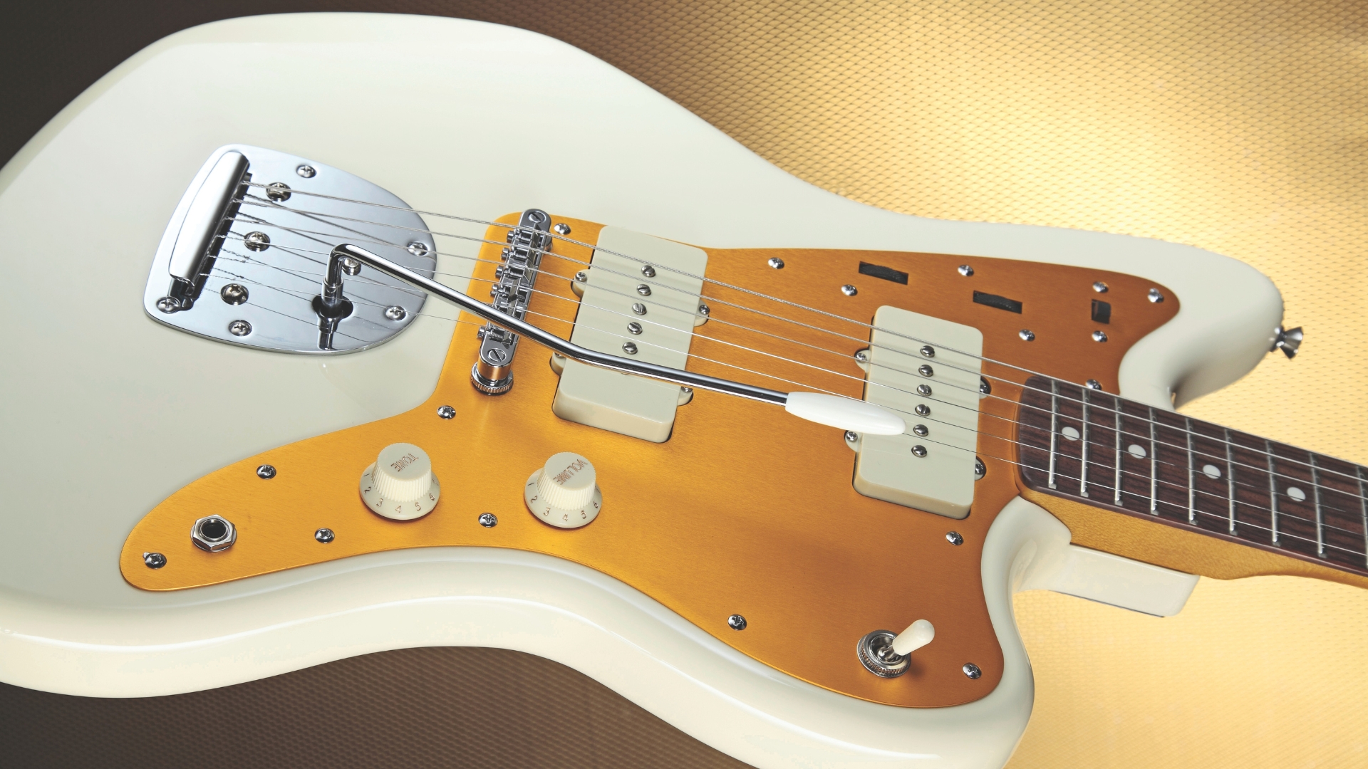 Close up of the body on a Squier J Mascis Jazzmaster electric guitar