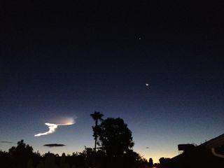 Stargazer Ryan Eiger captured this stunning view of an Army missile contrail along with Venus and the moon over Scottsdale, Ariz., before dawn on Sept. 13, 2012