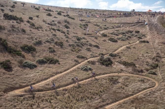 Riders make their way over Conterman's Kloof during the prologue