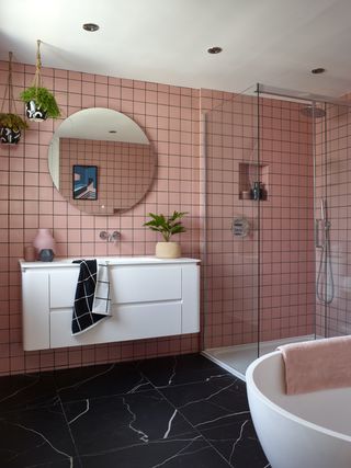 Family bathroom with pink tiles