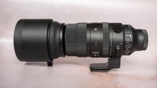SIGMA 150-600mm f/5-6.3 DG DN OS lens on a plain background
