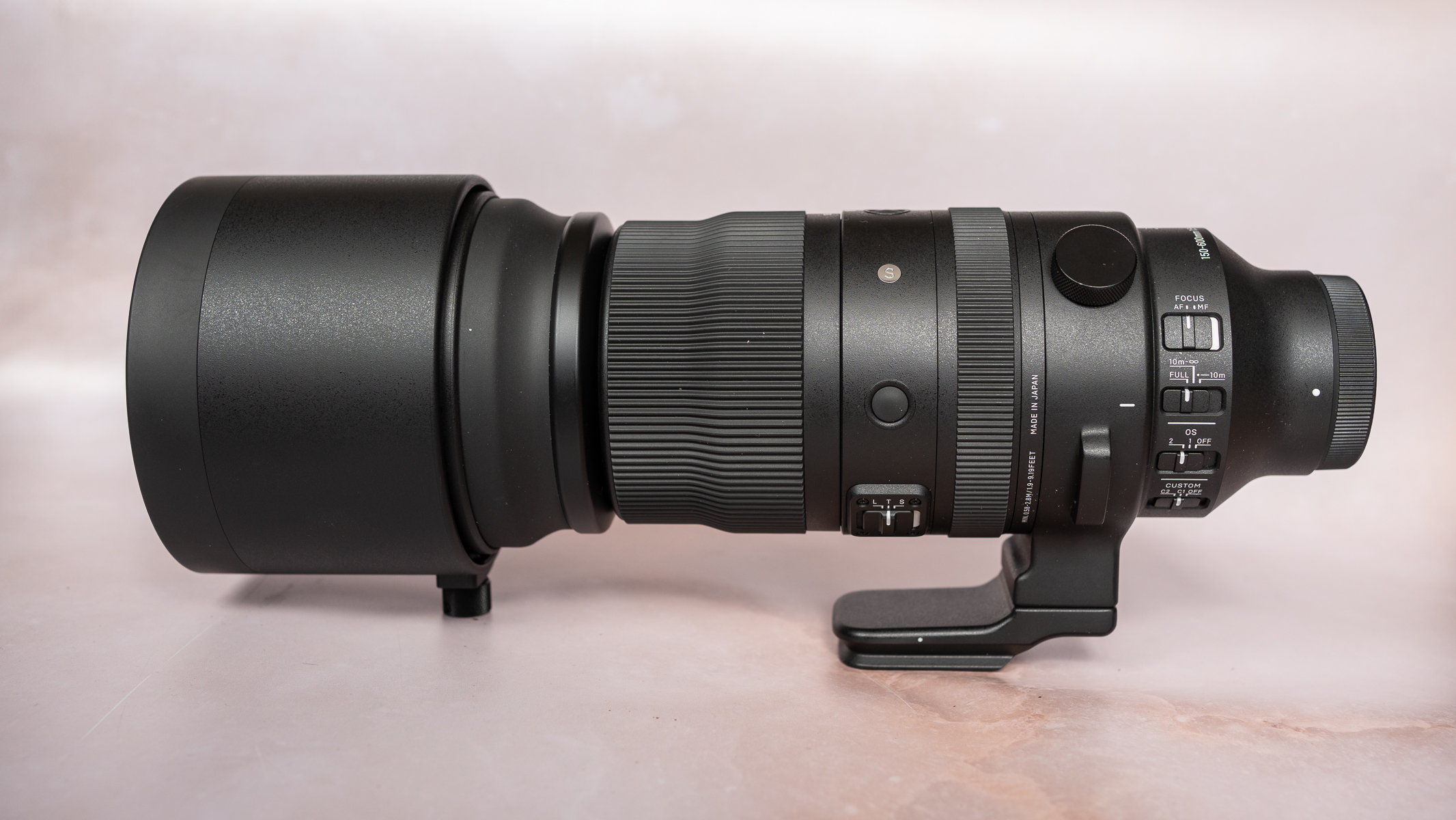 SIGMA 150-600mm f/5-6.3 DG DN OS lens on a plain background