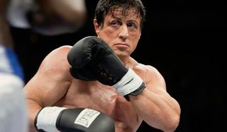 Rocky Balboa in the ring, guarding himself from an attack