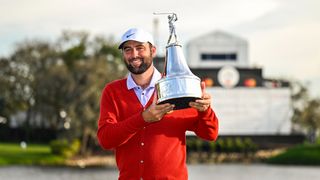 Scottie Scheffler with the Arnold Palmer Invitational trophy