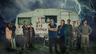 Dial M for Middlesbrough key art featuring the cast stoof in front of a caravan during a storm