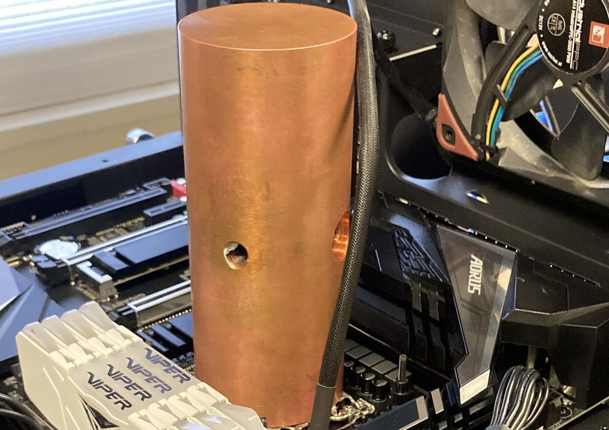 Why use fans when you can cool your CPU with 8 lbs of copper?
