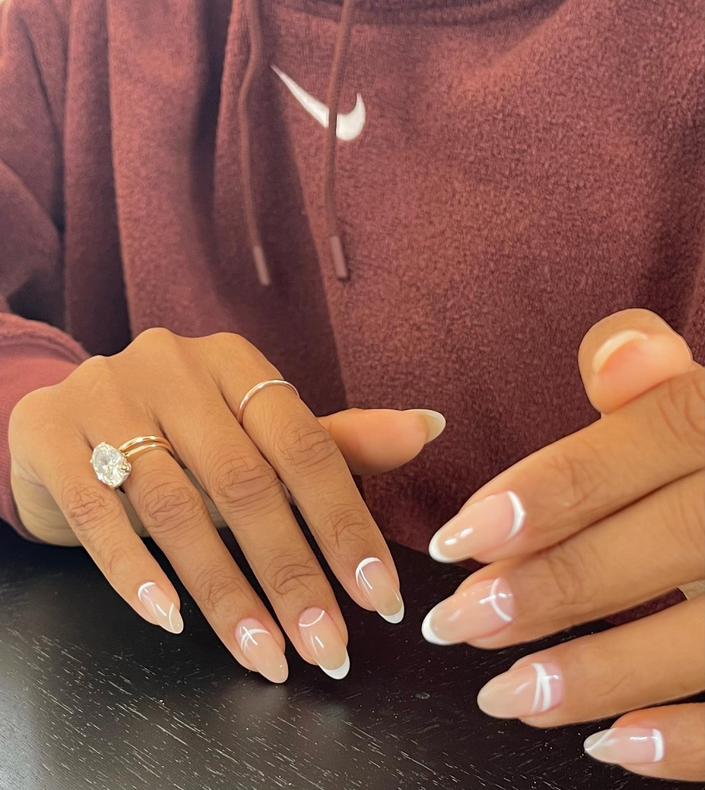 A white reverse French manicure design