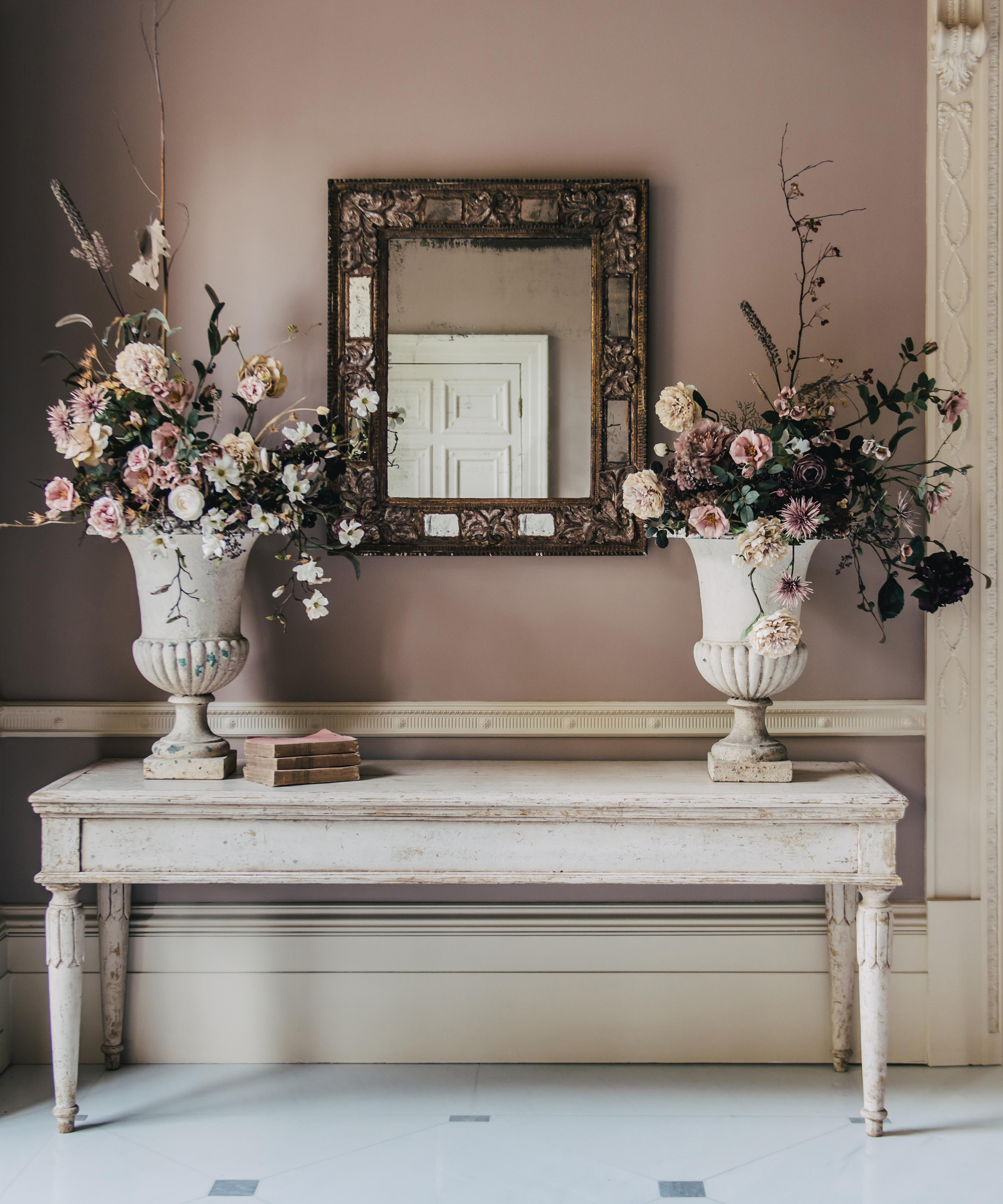 Silk flowers combine with dried stems for a painterly look