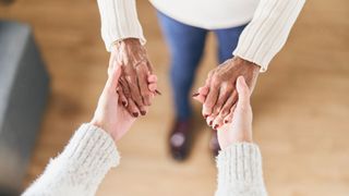 two people holding hands