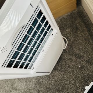 Pro Breeze 20L Premium Dehumidifier with Special Laundry Mode being tested in a carpeted room