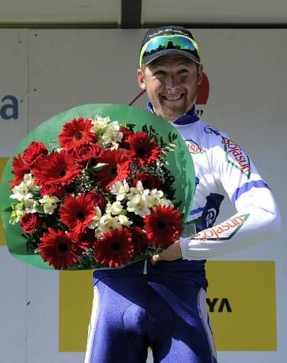 Julien Simon (Saur Sojasun) collects the flowers for his second Volta a Catalunya 2012 stage win