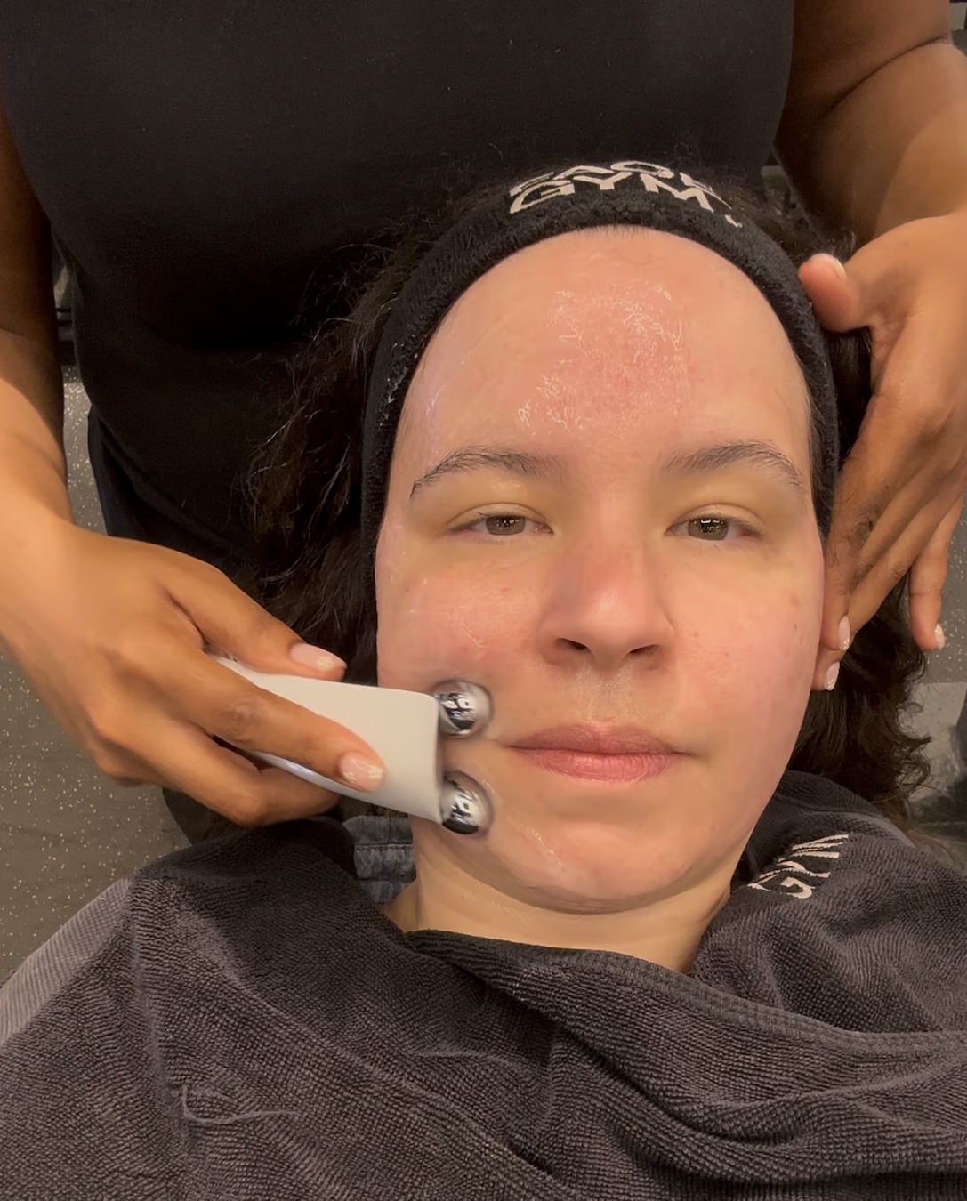 Mica Ricketts using the Facegym facial sculpting tool during treatment