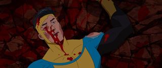 Invincible lays beaten and bloody on the floor