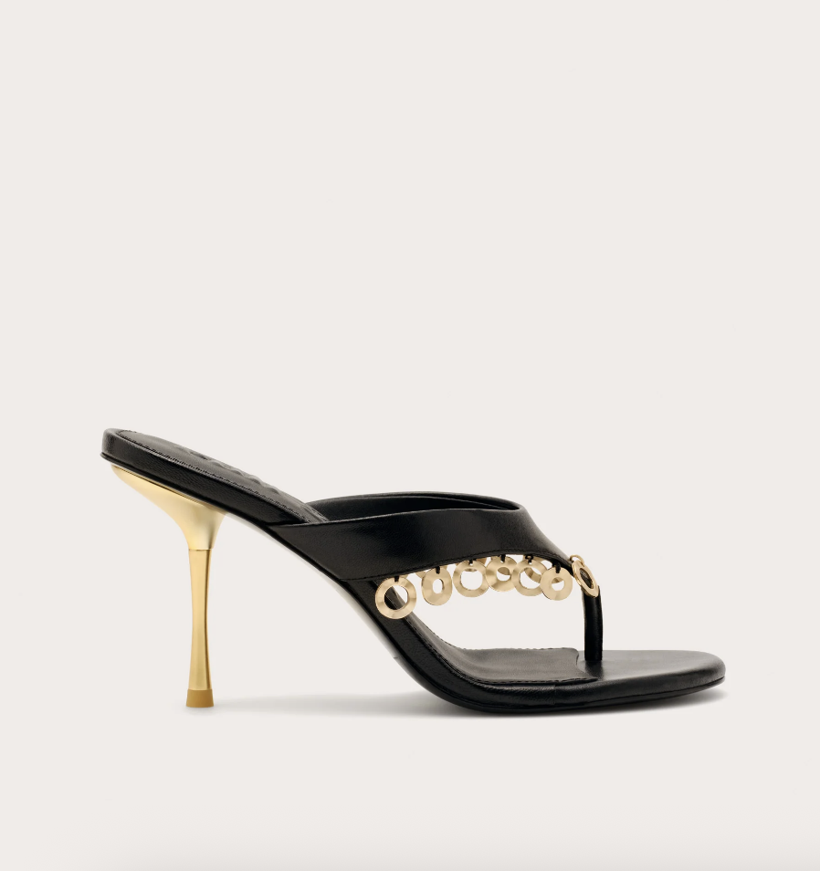 Cult Gaia Stella Heels, which feature a brown leather thong adorned with gold circles and a gold heel