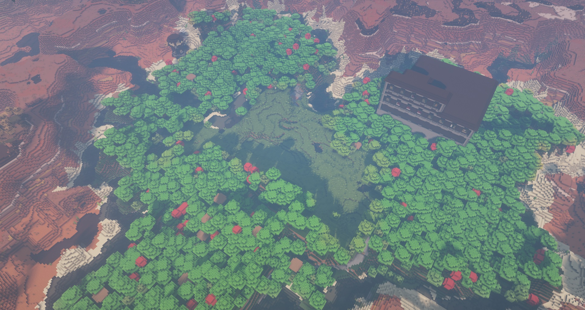 Minecraft seed - an aerial view of a forest shaped like a heart with a large mansion inside