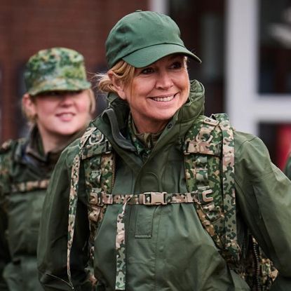 Queen Maxima wearing a military uniform and baseball cap