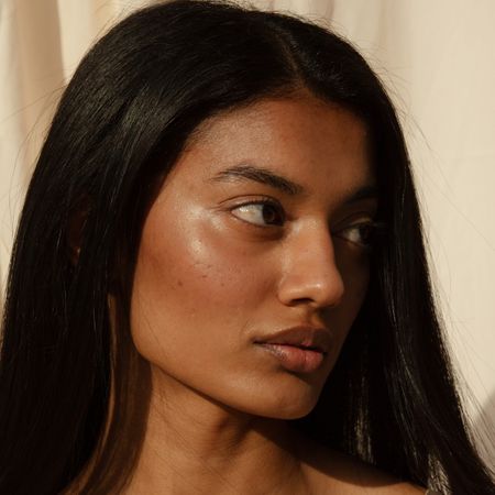 Photo of a woman with glowing skin 