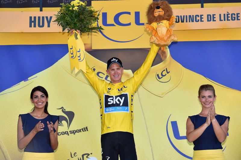 Chris Froome beaming to be back in yellow