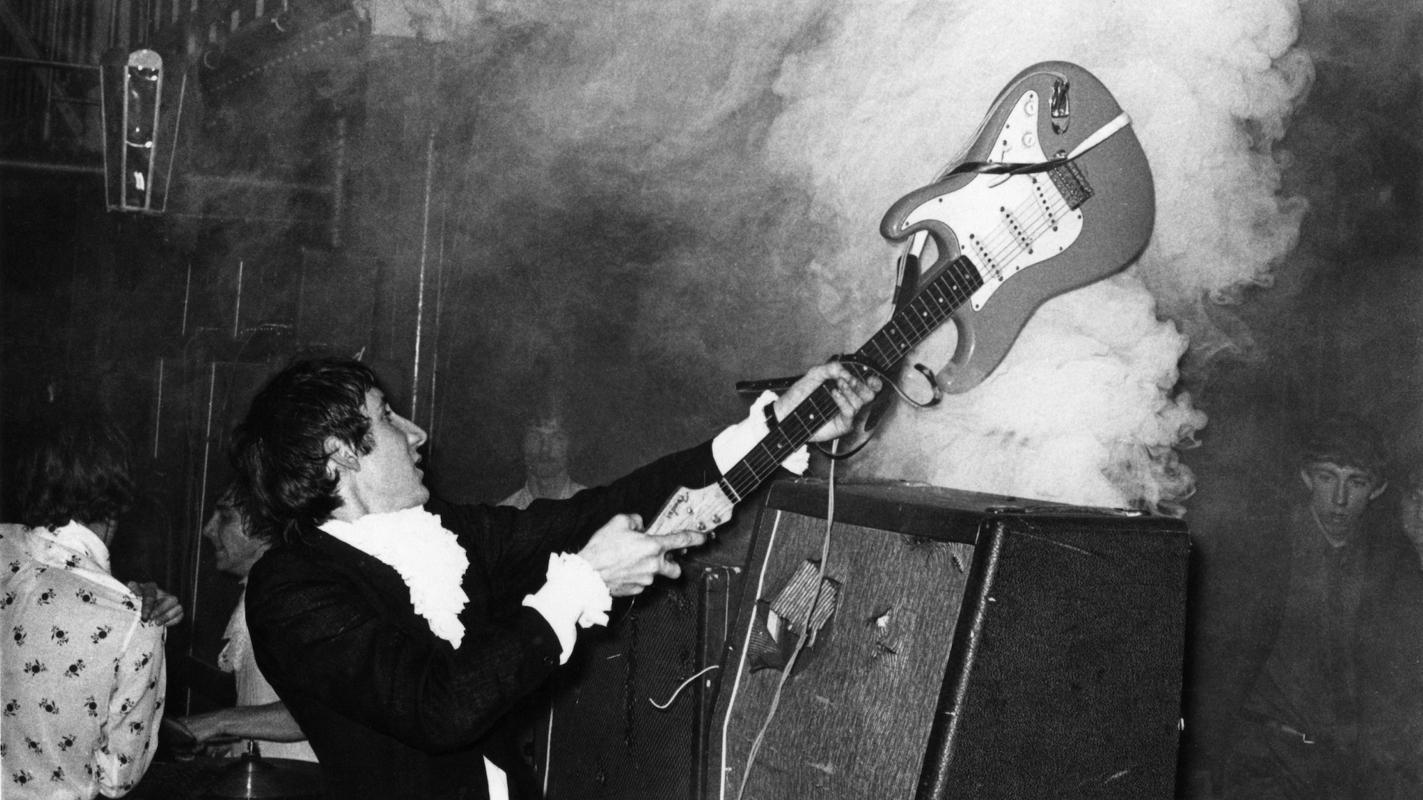 Pete Townshend smashes his Fender Stratocaster against a smoking amplifier