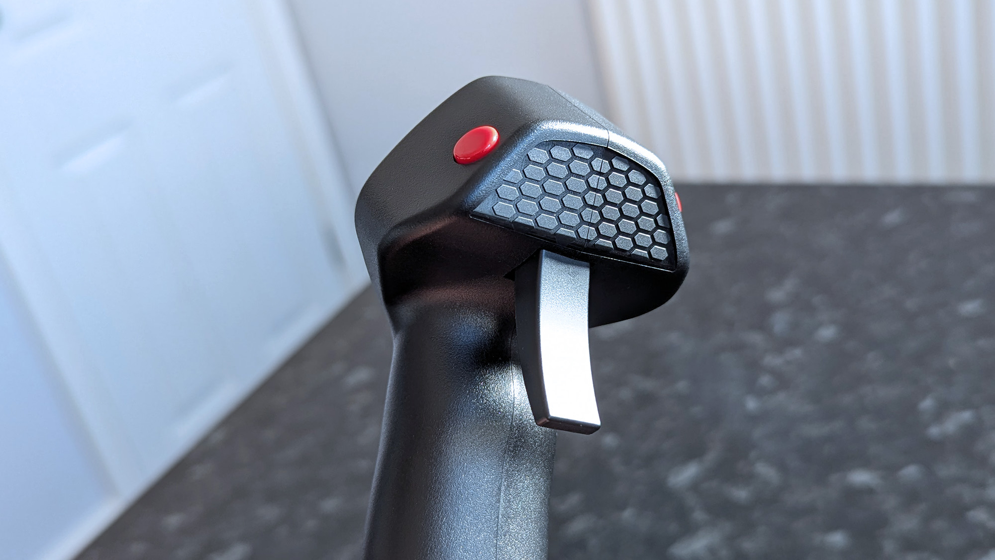 Honeycomb pattern found on the underside of a Foxtrot Aviation Stick, placed on a marble-patterned countertop