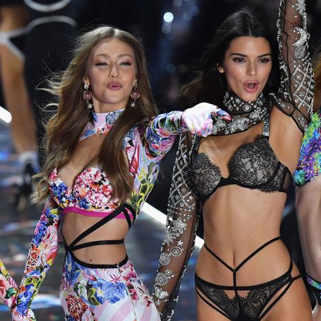 Gigi Hadid and Kendall Jenner onstage at the Victoria's Secret Fashion Show in 2017