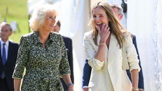 Camilla, Duchess of Cornwall and Lady Rothermere are seen during the tour of the Daily Mail Chalke Valley History Festival grounds