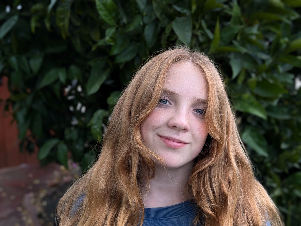 portrait of a teenage girl shot by a Pixel 8a