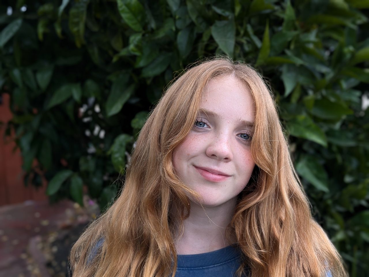 portrait of a teenage girl shot by a Pixel 8a