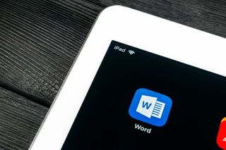 Microsoft Word app icon on Apple iPad Pro screen close-up