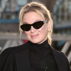 Renee Zellweger wears black sunglasses