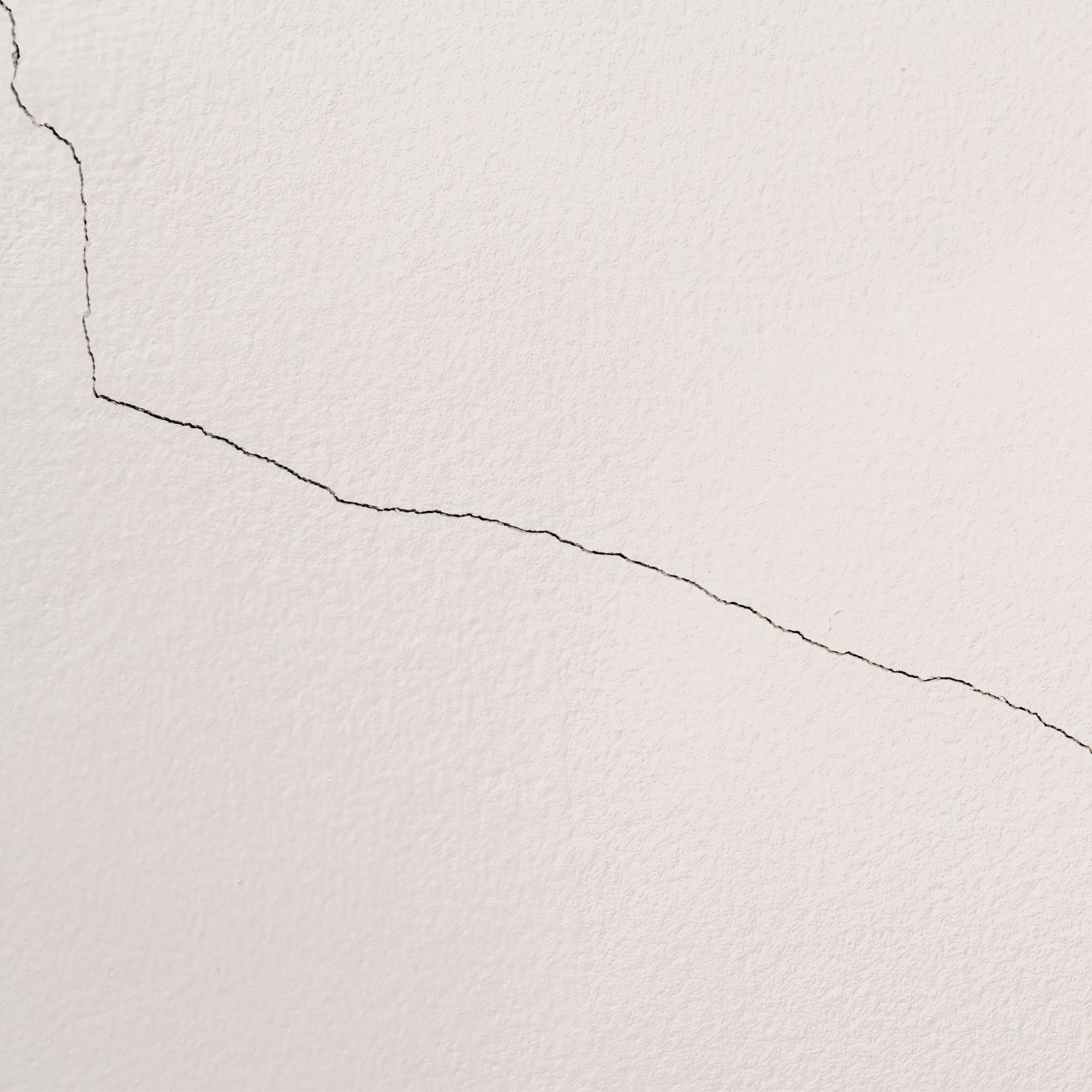 hairline crack in plastered wall