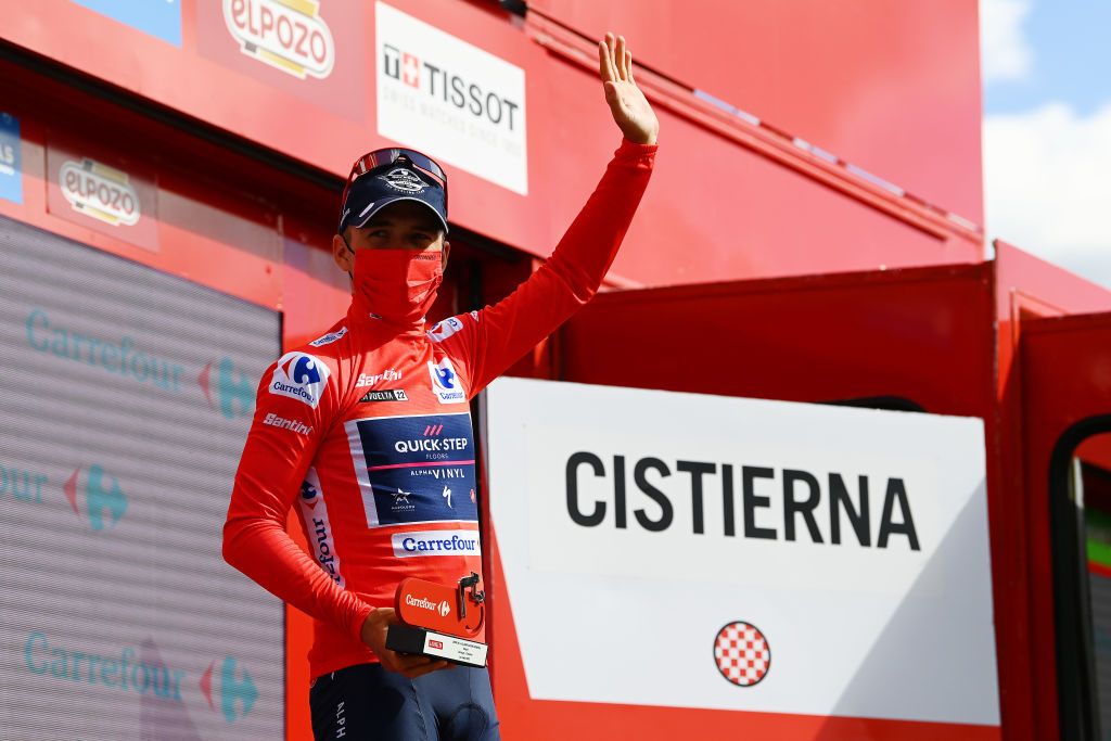 CISTIERNA SPAIN AUGUST 26 Remco Evenepoel of Belgium and Team QuickStep Alpha Vinyl Red Leader Jersey celebrates at podium during the 77th Tour of Spain 2022 Stage 7 a 190km stage from Camargo to Cistierna LaVuelta22 WorldTour on August 26 2022 in Cistierna Spain Photo by Tim de WaeleGetty Images