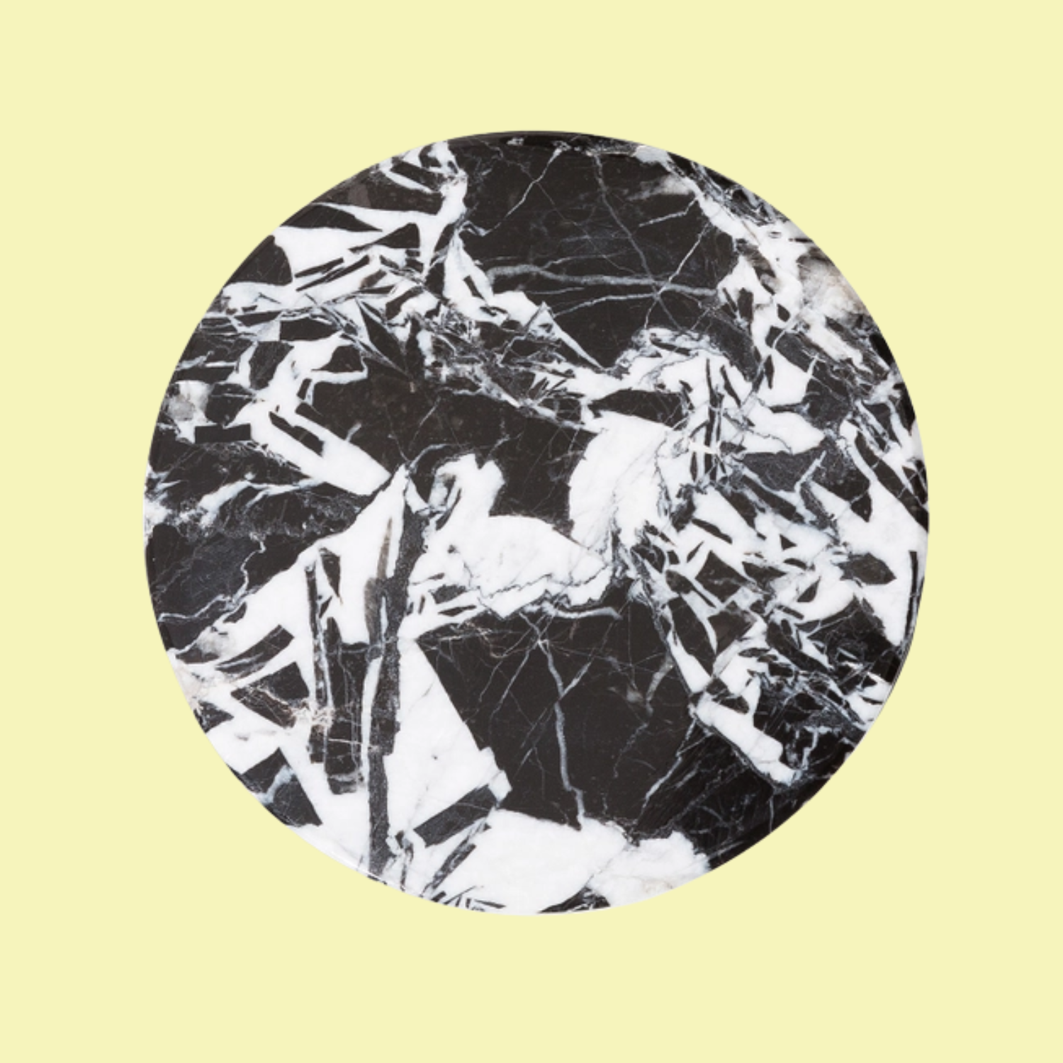 A black and white marble candle lid