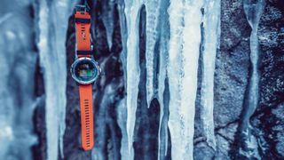 Coros Vertix watch suspended between icicles