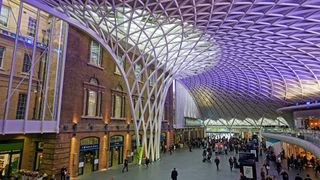 Interior of King&#039;s Cross train station in London. King&#039;s Cross is operated by Network Rail alongside several stations across London