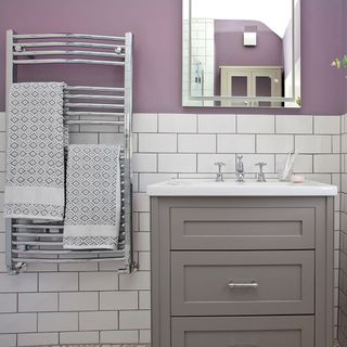 bathroom with white sink and mirror