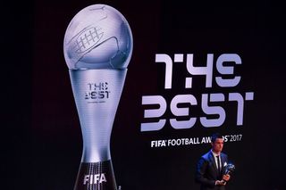 Real Madrid and Portugal forward Cristiano Ronaldo stands with the trophy after winning The Best FIFA Men's Player of 2017 Award during The Best FIFA Football Awards ceremony, on October 23, 2017 in London.