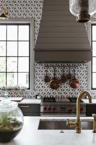 A kitchen designed with gray tiles