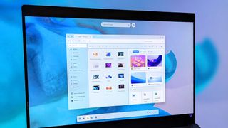 Brilliant Windows 12 concept desktop shown on a laptop screen.
