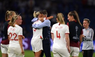 Phil Neville and captain Steph Houghton celebrate England's quarter-final win over Norway