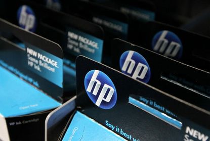 Packages of HP ink cartridges.