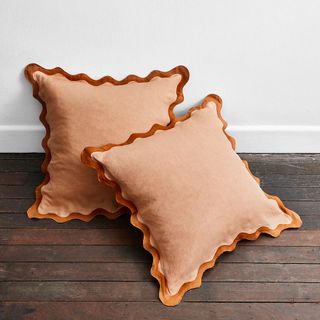 A rust and terracotta pillowcase