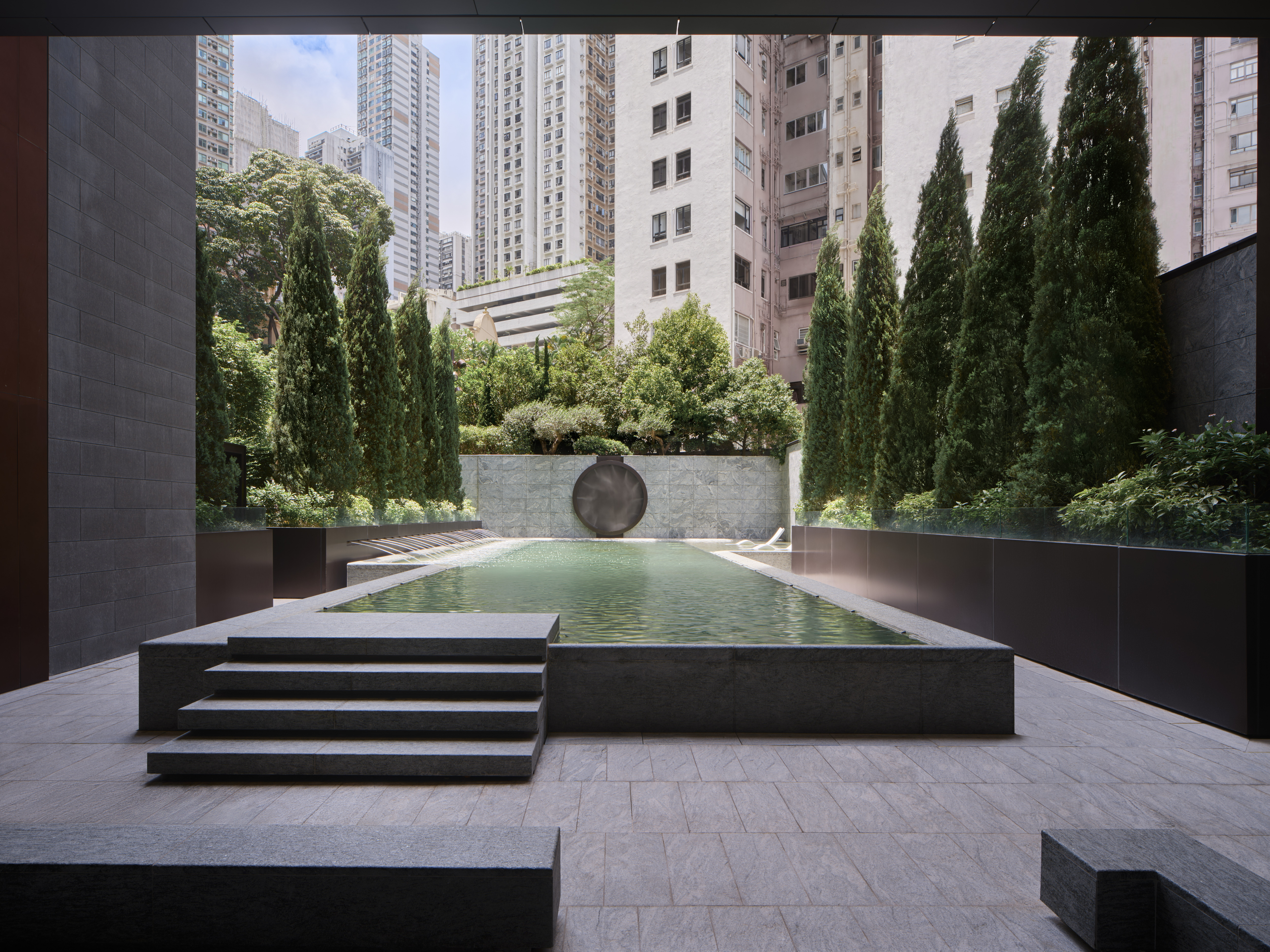 The Legacy, Hong Kong interiors, luxurious common spaces with lots of bronze and marbles