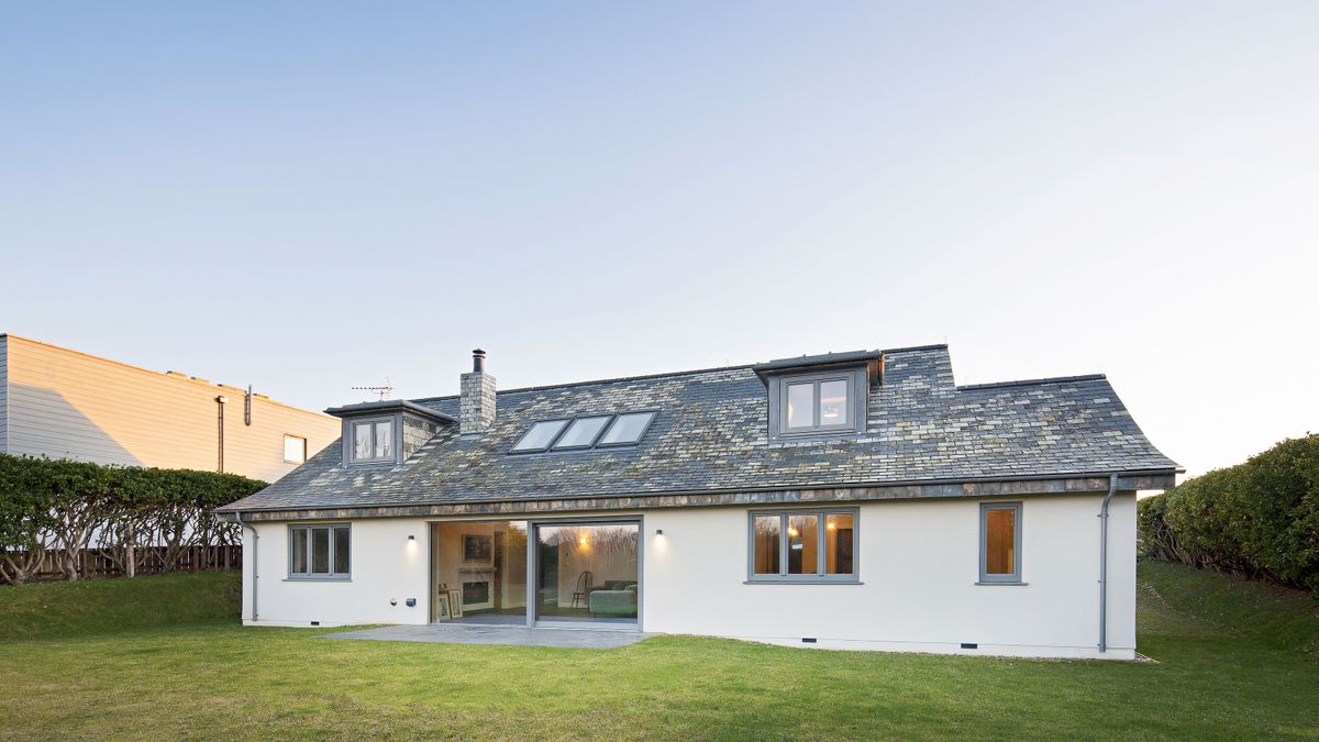 one and a half storey home with slate roof