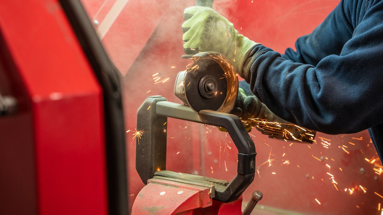 Hiplok 1000 Series bike lock being cut by an angle grinder