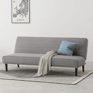 kitto sofa bed with white walls cushion and cover